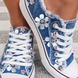 Denim sneaker met bloemen