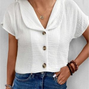 Top met knopen en kraag