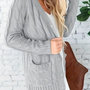 Emilie - Effen en nonchalant kabelgebreid jack met lange mouwen